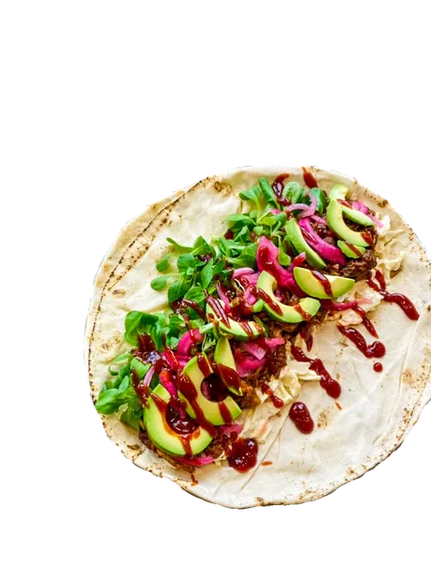 Open flatbread wrap with fresh toppings